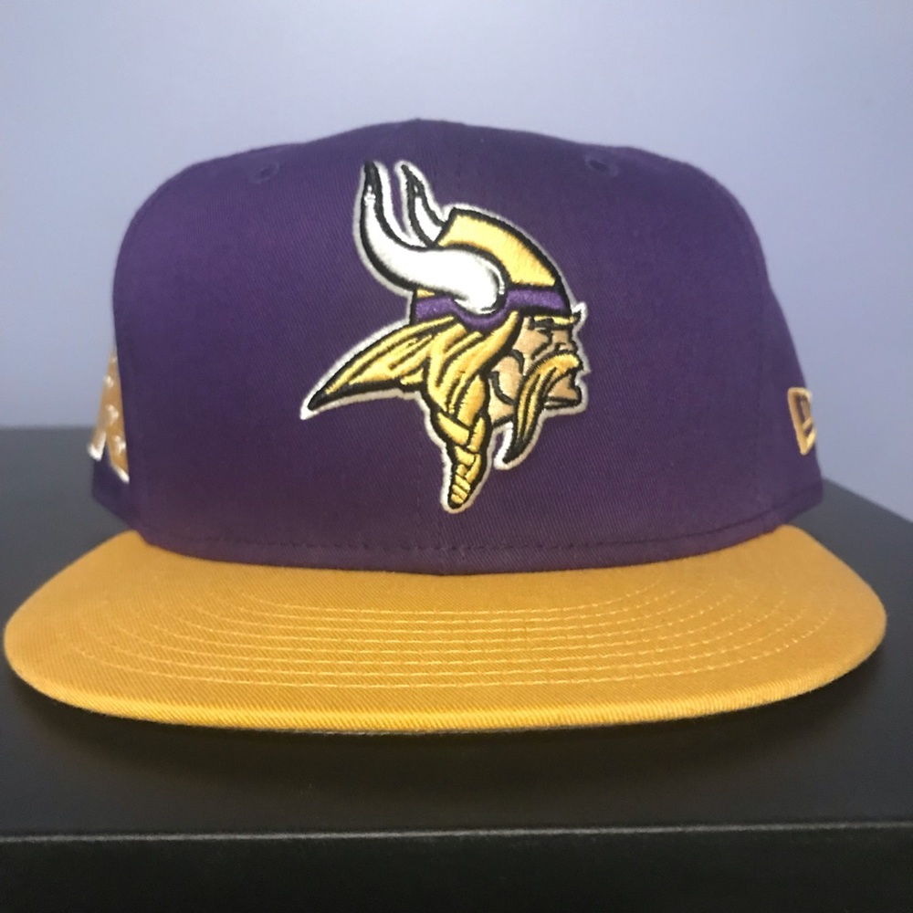 Minnesota Vikings New Era Snapback Hat.